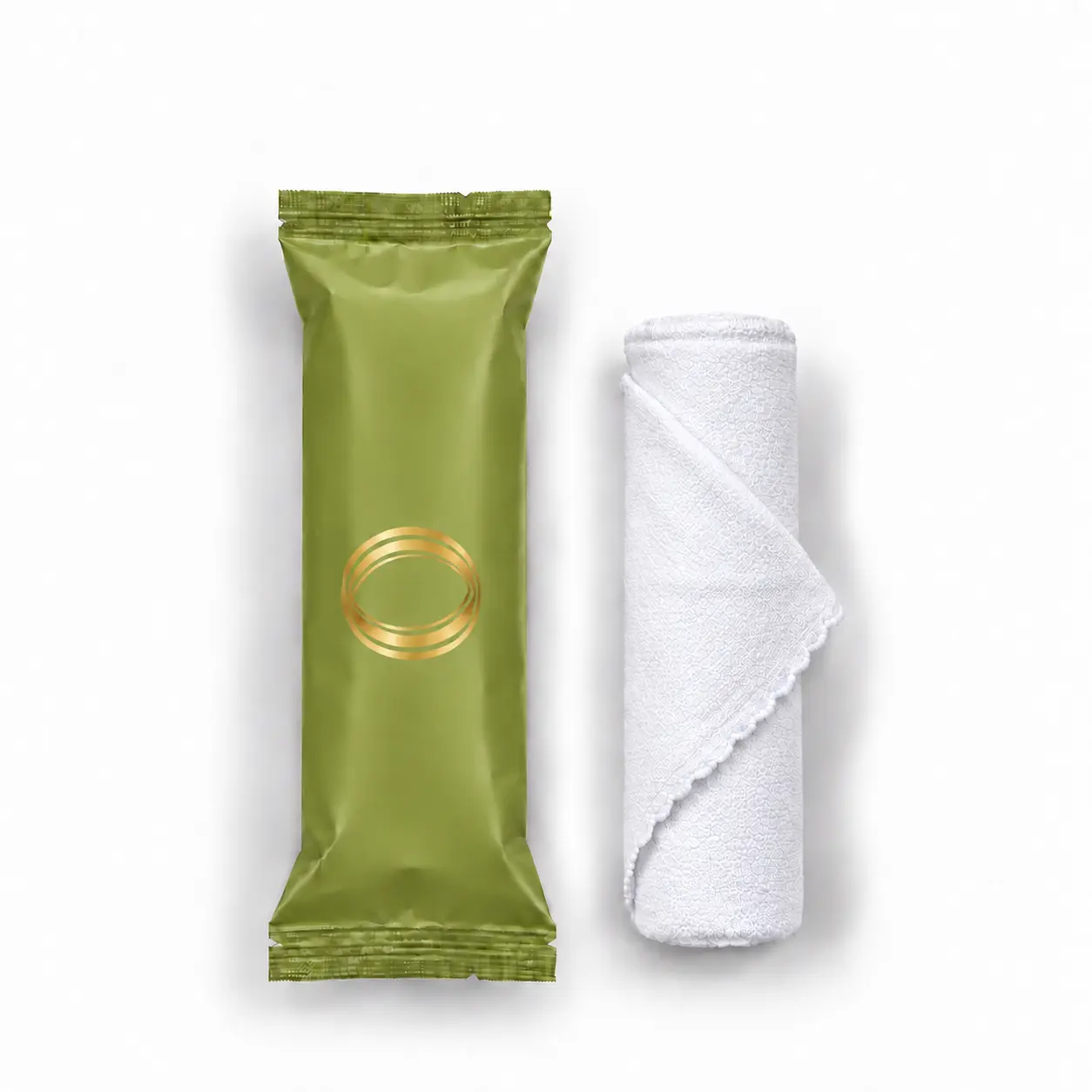 Citronella oshibori towel in olive green packaging, shown upright beside the rolled white microfiber towel