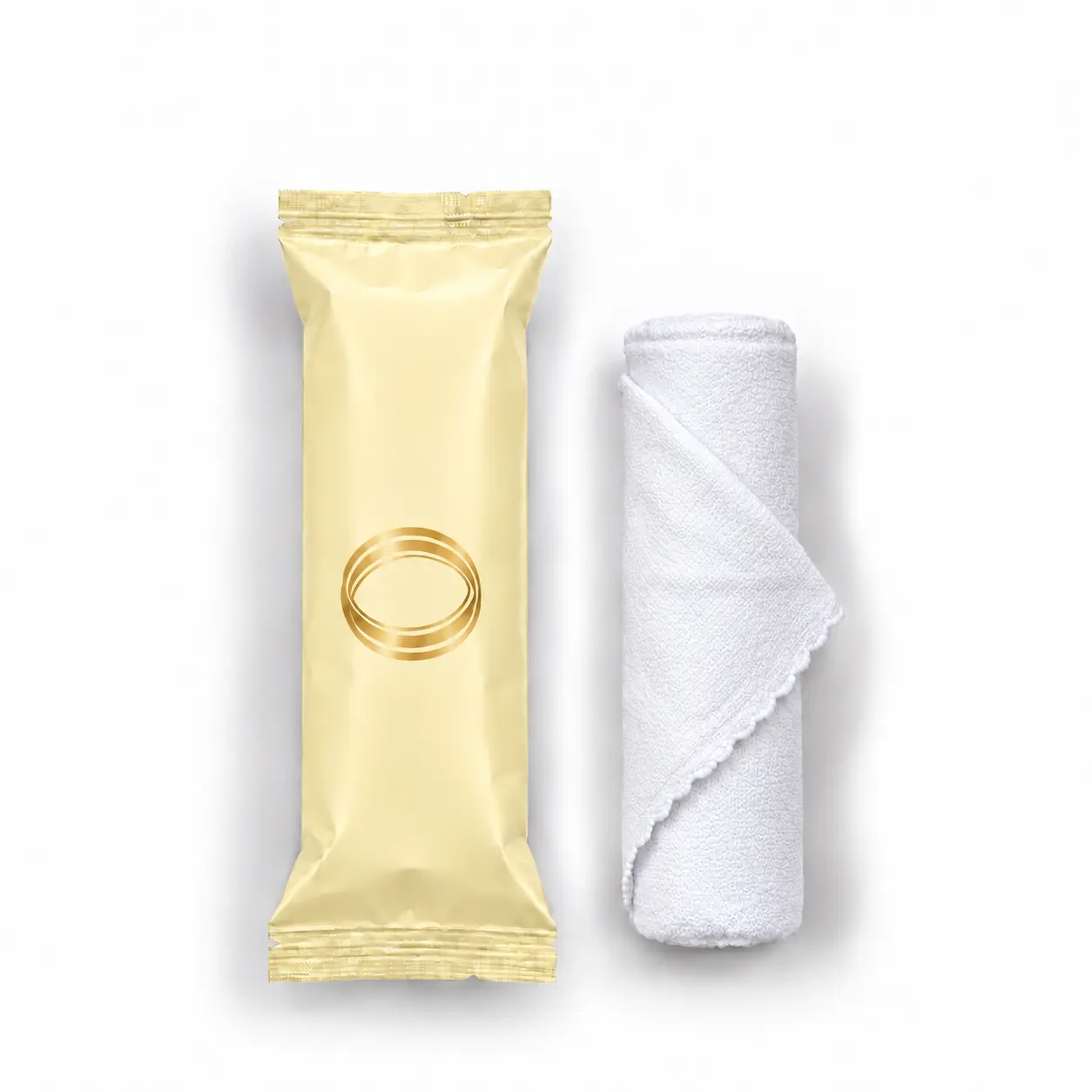 Lemon oshibori towel in pale yellow packaging, shown upright beside the rolled white microfiber towel